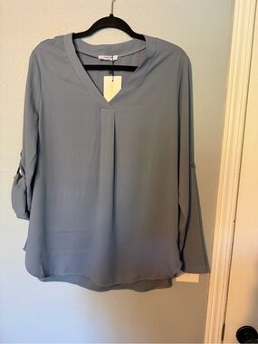 V-Neck Roll-Tab Blouse in Dusty Blue -